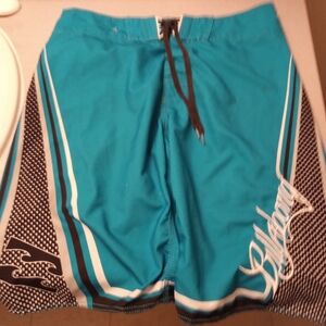 Teal and Black Billabong Board Shorts